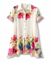 Cargar imagen en el visor de la galería, Vestido de lino blanco con estampado floral multicolor y diseño camisero con botones