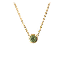 Cargar imagen en el visor de la galería, collar chapado en oro con un cristal de swarovski en verde claro